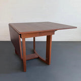 Mid-Century Modern Drop-Leaf Dining Table By T.H. Robsjohn-Gibbings