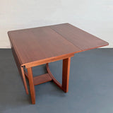 Mid-Century Modern Drop-Leaf Dining Table By T.H. Robsjohn-Gibbings