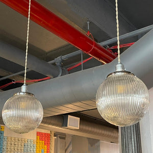 Pair Of Ribbed Glass Globe Pendant Lights